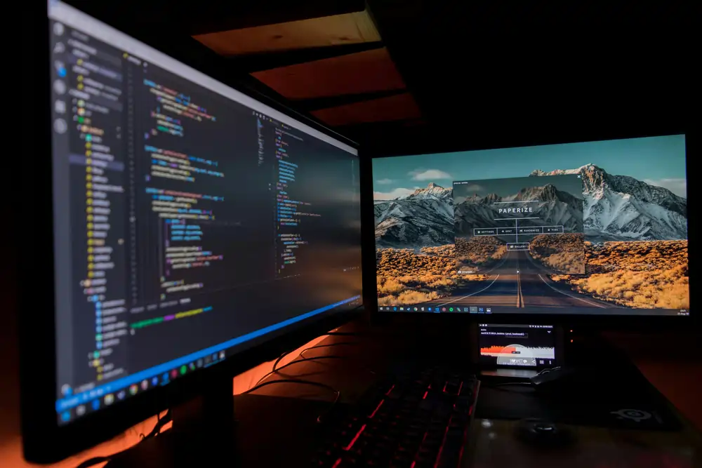 Image of a developer sitting in front of a computer.